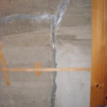 Vertical foundation crack injected
